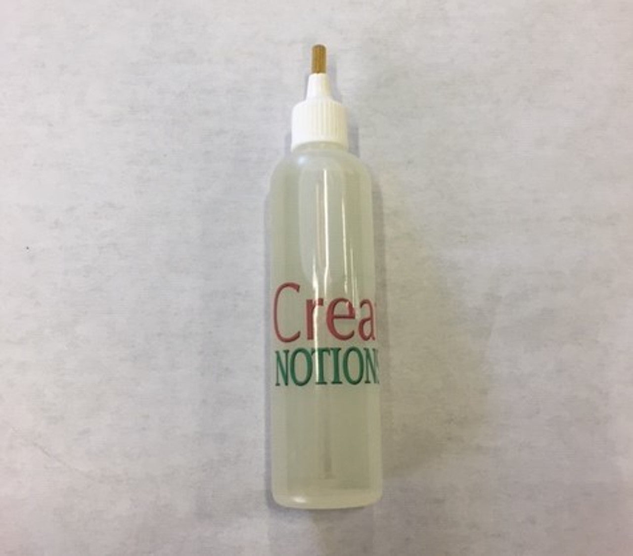 National Flooring Equipment - Huile pour machine à coudre - 1oz