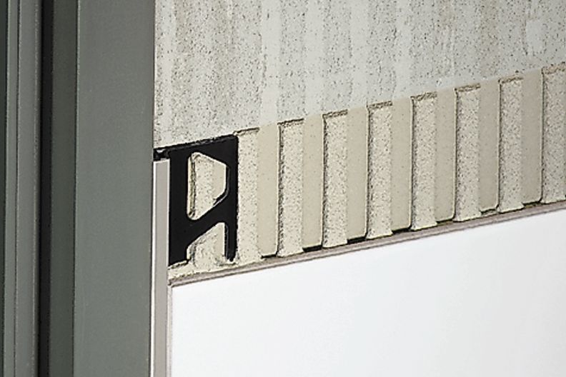Schluter DILEX-BWA - 3/8" (10 mm) x 8' 2-1/2" - Profilé de joint de mouvement de périmètre isolant le carrelage des structures - plastique PVC blanc éclatant ||BWA100BW